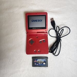 Vintage Nintendo Game Boy SP Red Portable Gaming Device With Peter Pan Game